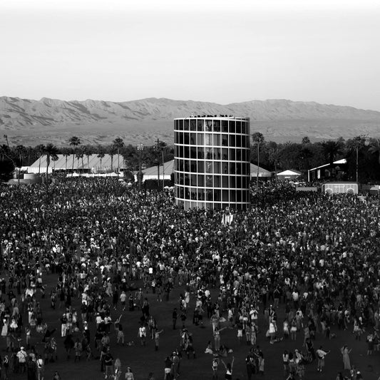 Crowd packed into the Coachella main stage field during Weekend 2 at sunset