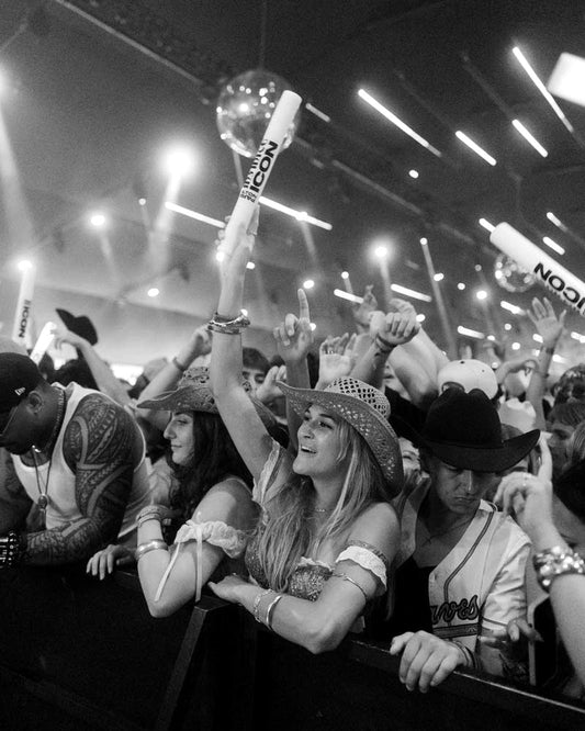Stagecoach festival crowd in cowboy hats at sunset in Indio