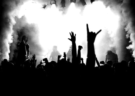 Massive festival crowd stretching to the horizon
