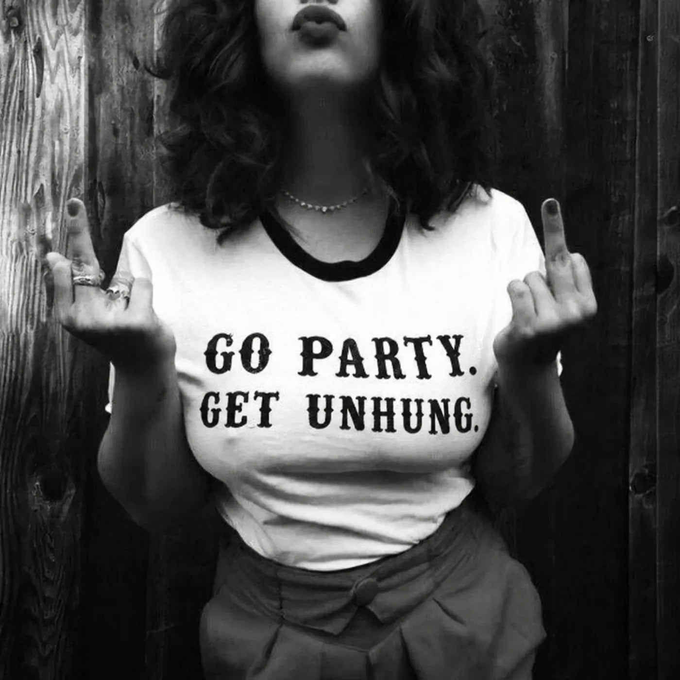 Black and white photo of a woman in a Go Party. Get UNHUNG. T-shirt